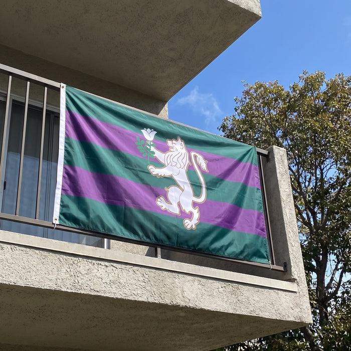 Lambda Chi Alpha Flags and Banners — hanging on an apartment balcony