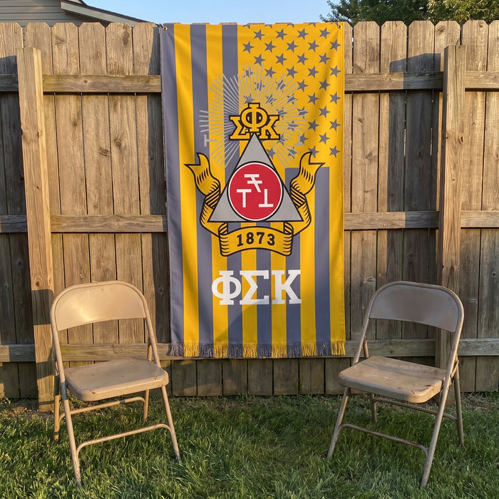 Phi Sigma Kappa Flags and Banners — on a backyard fence