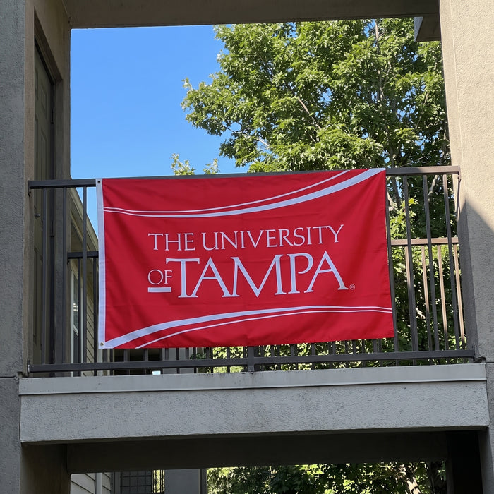University of Tampa Flags and Banners — hanging on an apartment balcony
