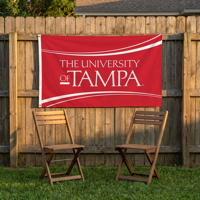 University of Tampa Flags and Banners — on a backyard fence