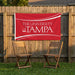 University of Tampa Flags and Banners — on a backyard fence