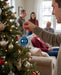 Sigma Chi Christmas Ornament - Snowflake Metal — lifestyle scene